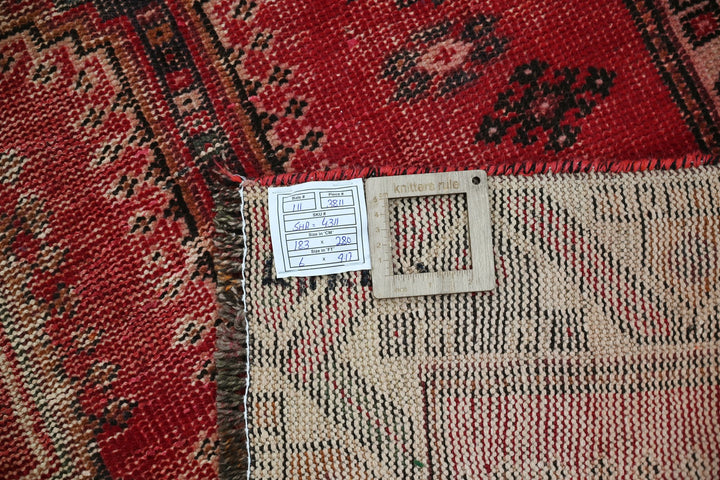 red Medium rug 6' 0" x 9' 2"