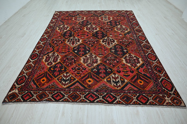 red Large rug 6' 7" x 9' 2"