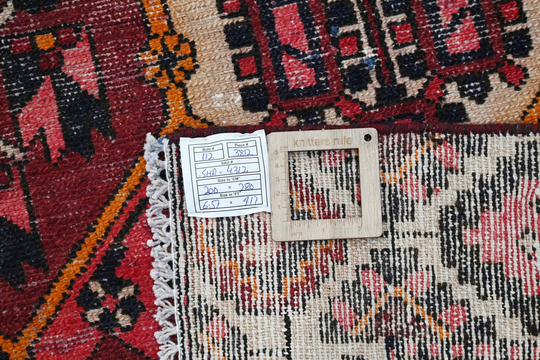 red Large rug 6' 7" x 9' 2"