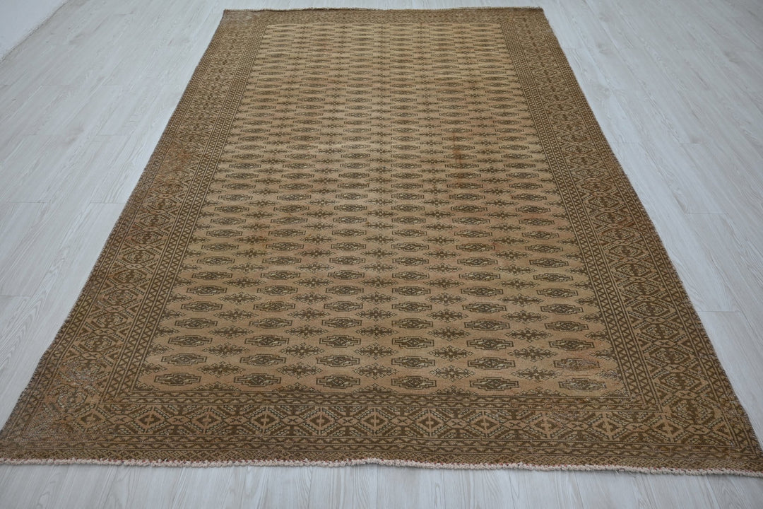 brown Medium rug 6' 1" x 9' 3"