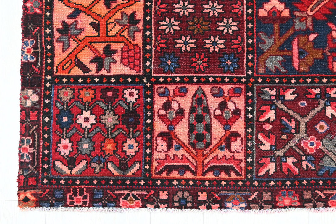 red Large rug 7' 3" x 8' 8"