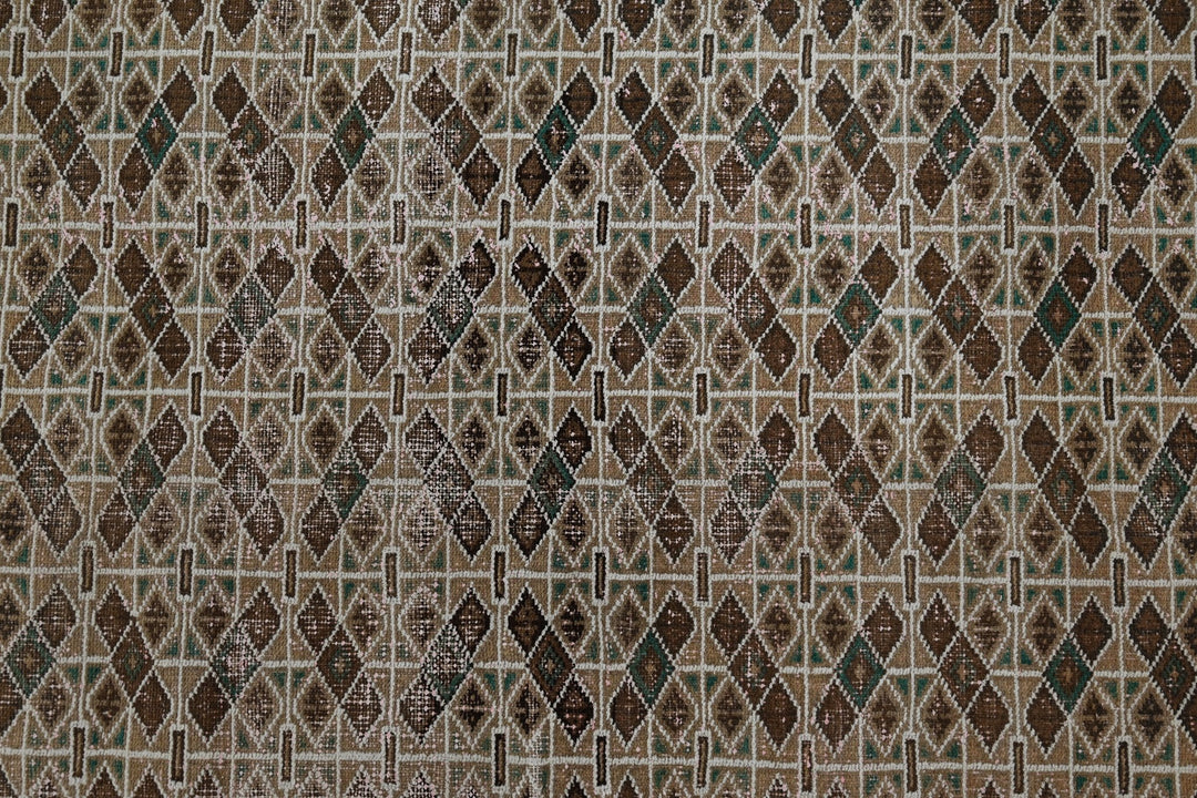 brown Large rug 6' 9" x 9' 0"