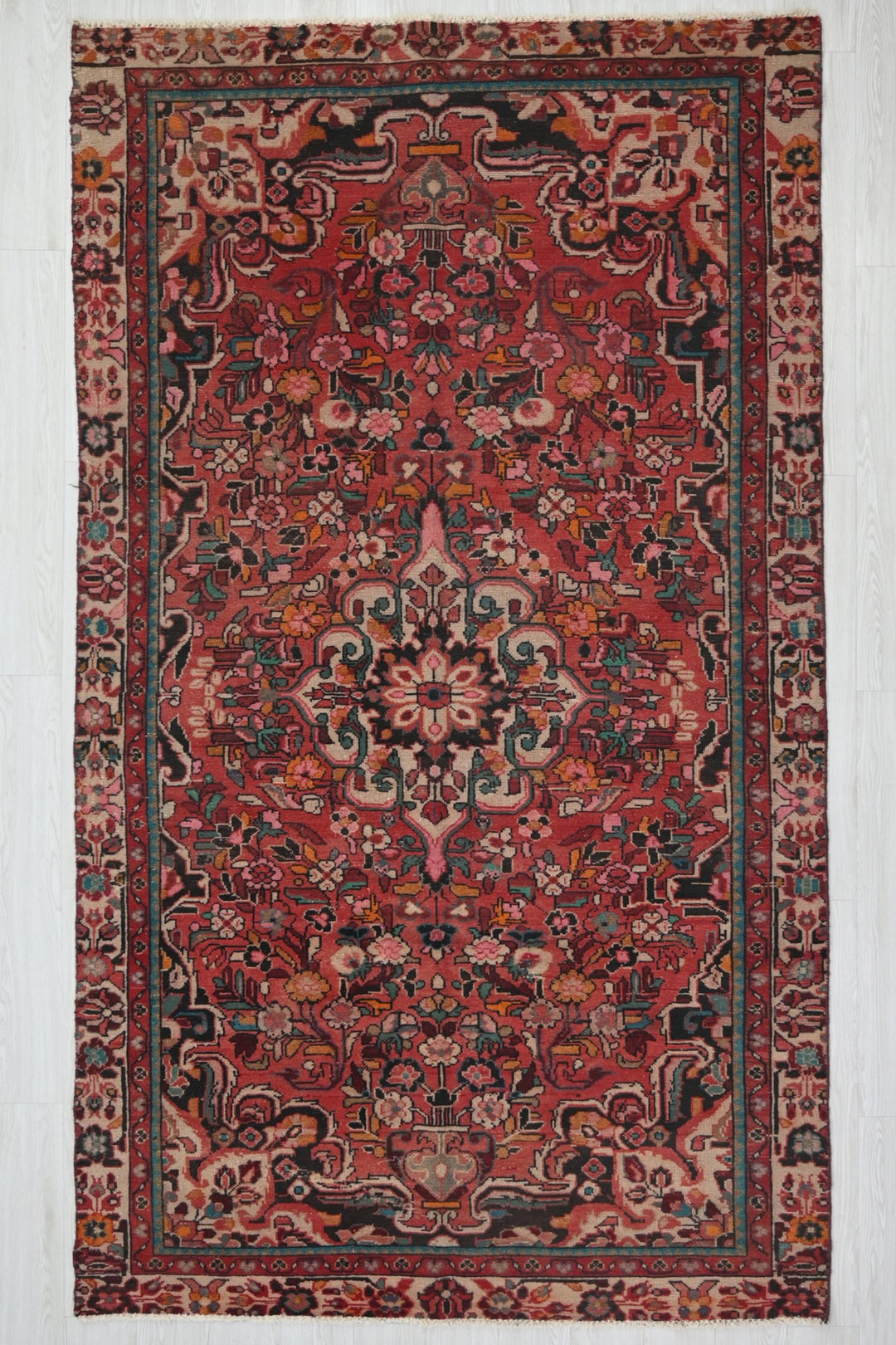 red Medium rug 5' 2" x 9' 1"