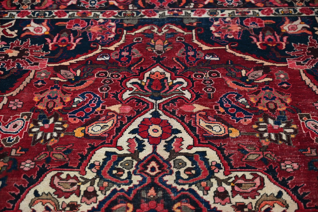 red Large rug 6' 11" x 10' 1"