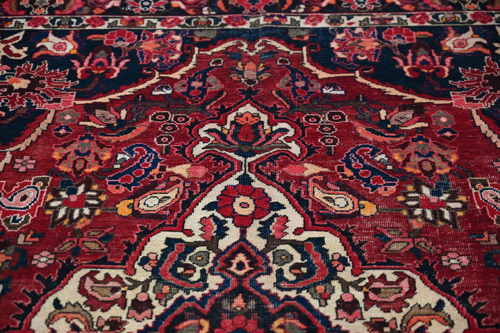 red Large rug 6' 11" x 10' 1"