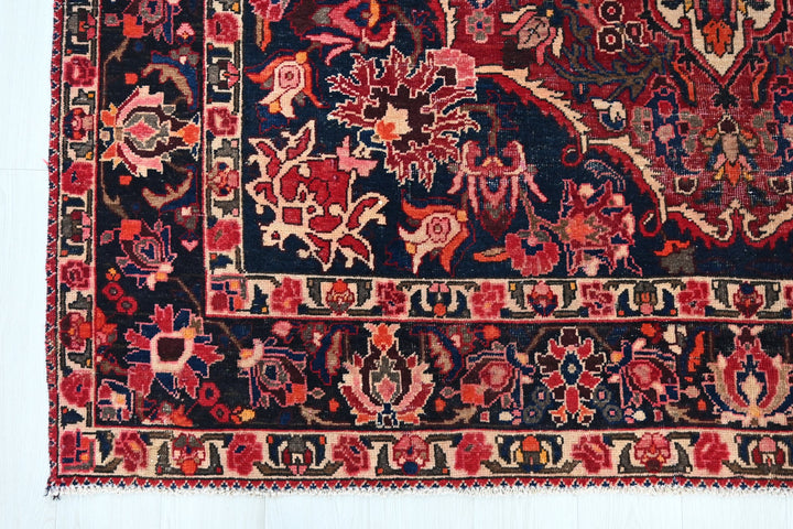 red Large rug 6' 11" x 10' 1"