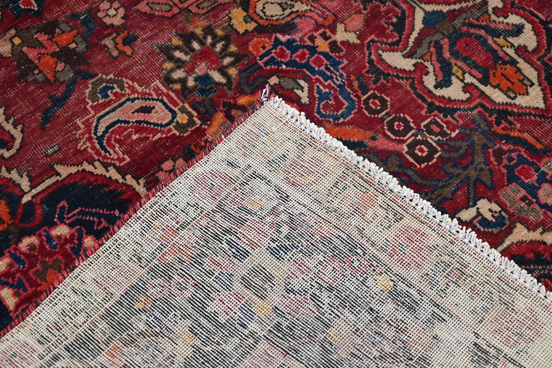 red Large rug 6' 11" x 10' 1"