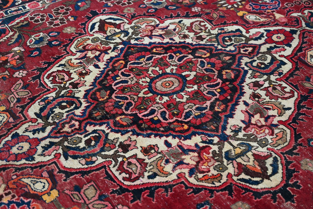 red Large rug 6' 11" x 10' 1"