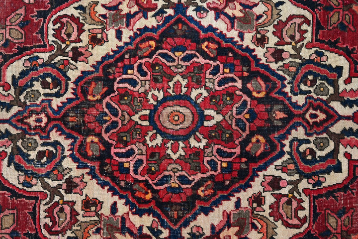 red Large rug 6' 11" x 10' 1"