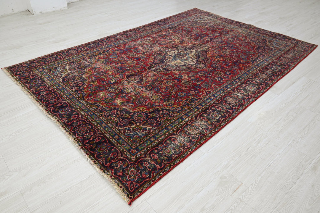 red Medium rug 5' 9" x 8' 8"
