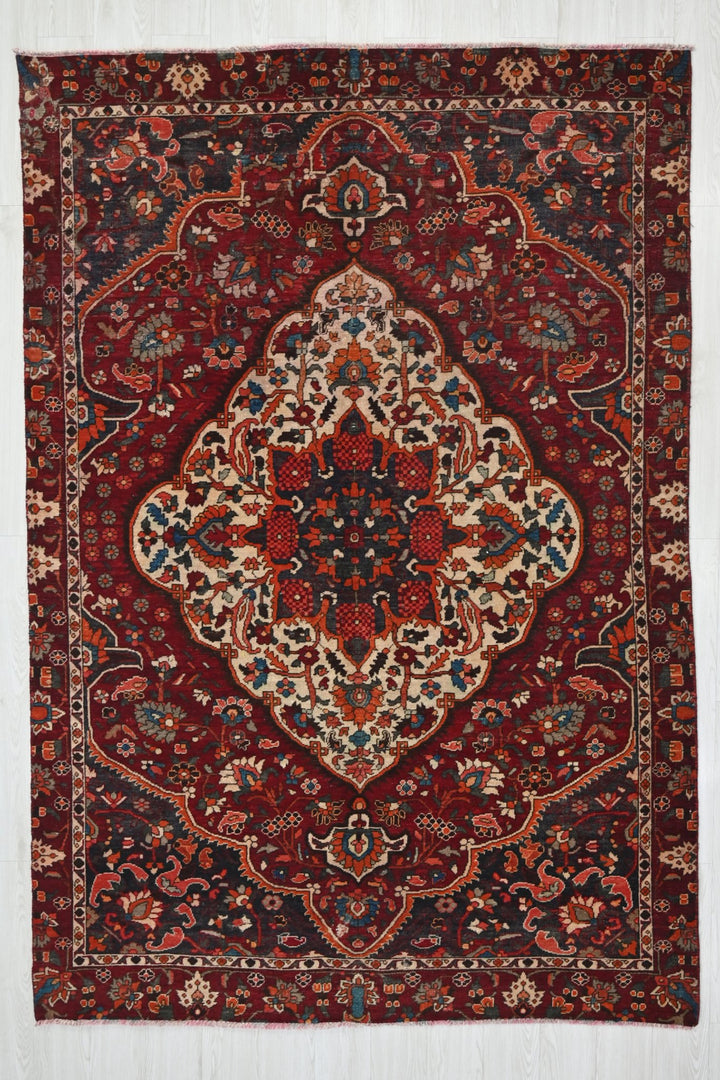 red Medium rug 5' 9" x 8' 10"