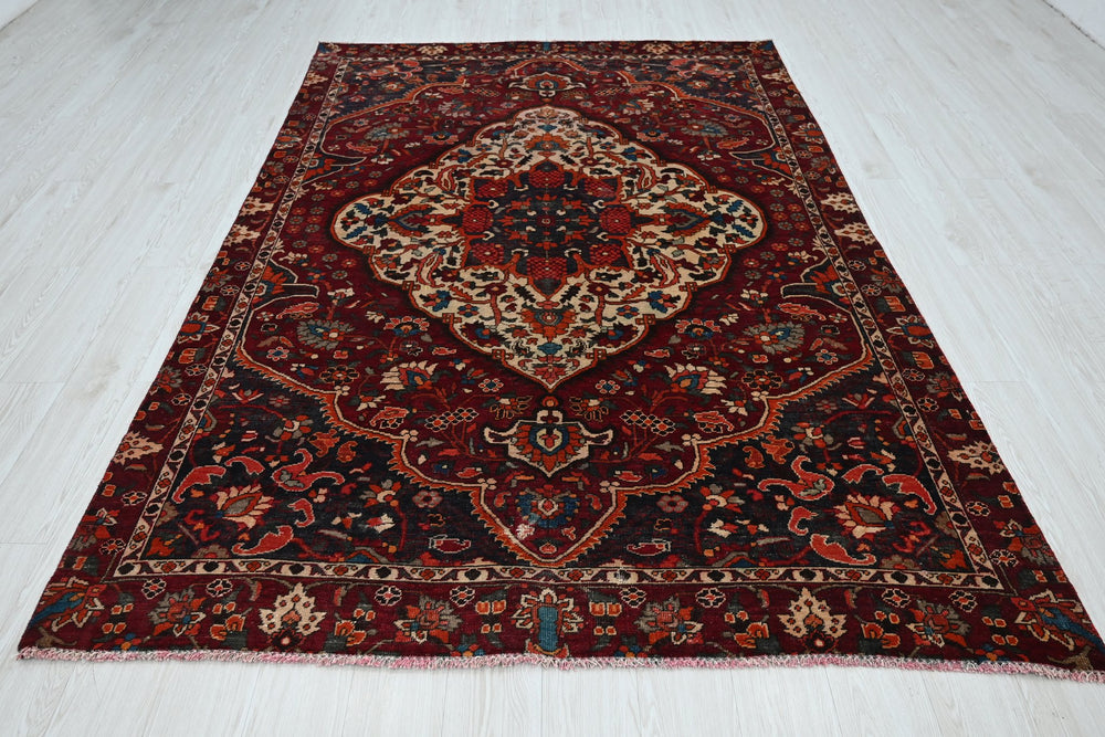 red Medium rug 5' 9" x 8' 10"