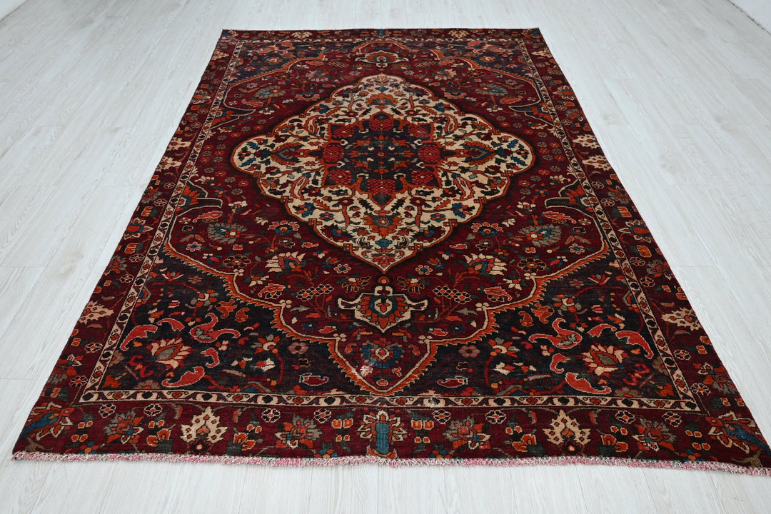 red Medium rug 5' 9" x 8' 10"