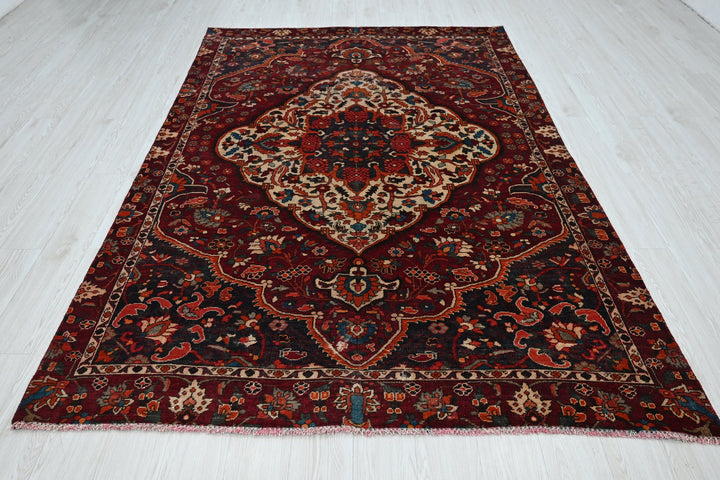 red Medium rug 5' 9" x 8' 10"