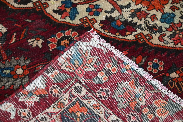 red Medium rug 5' 9" x 8' 10"