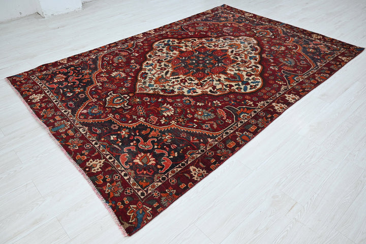 red Medium rug 5' 9" x 8' 10"