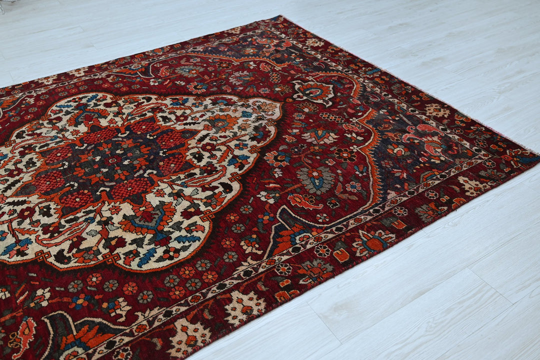 red Medium rug 5' 9" x 8' 10"