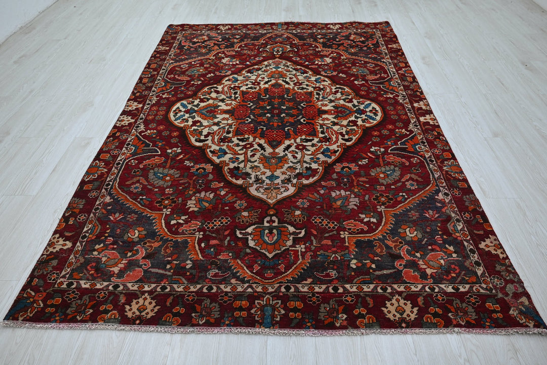 red Medium rug 5' 9" x 8' 10"