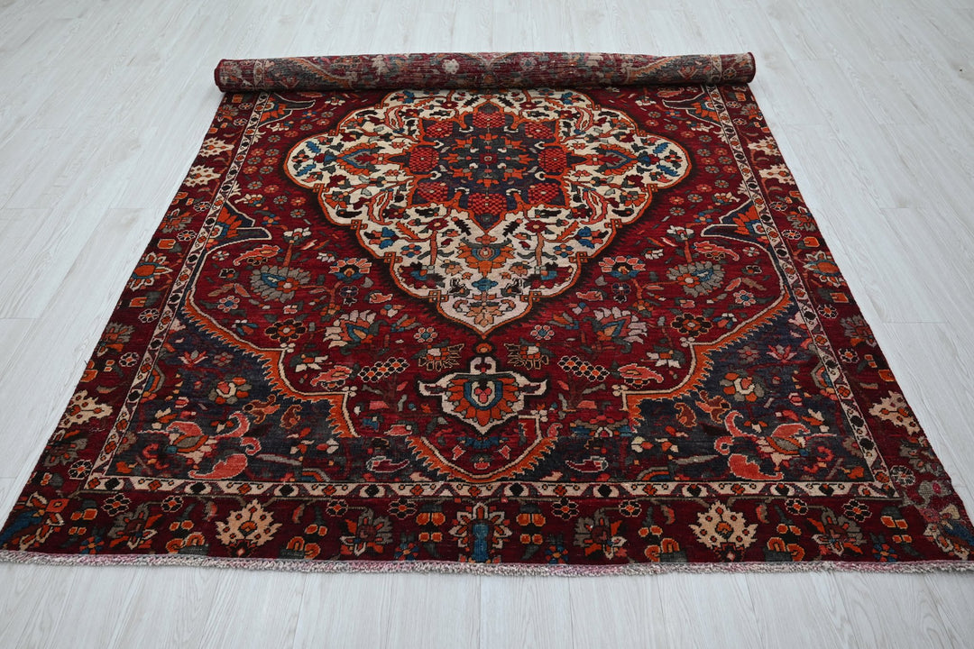 red Medium rug 5' 9" x 8' 10"