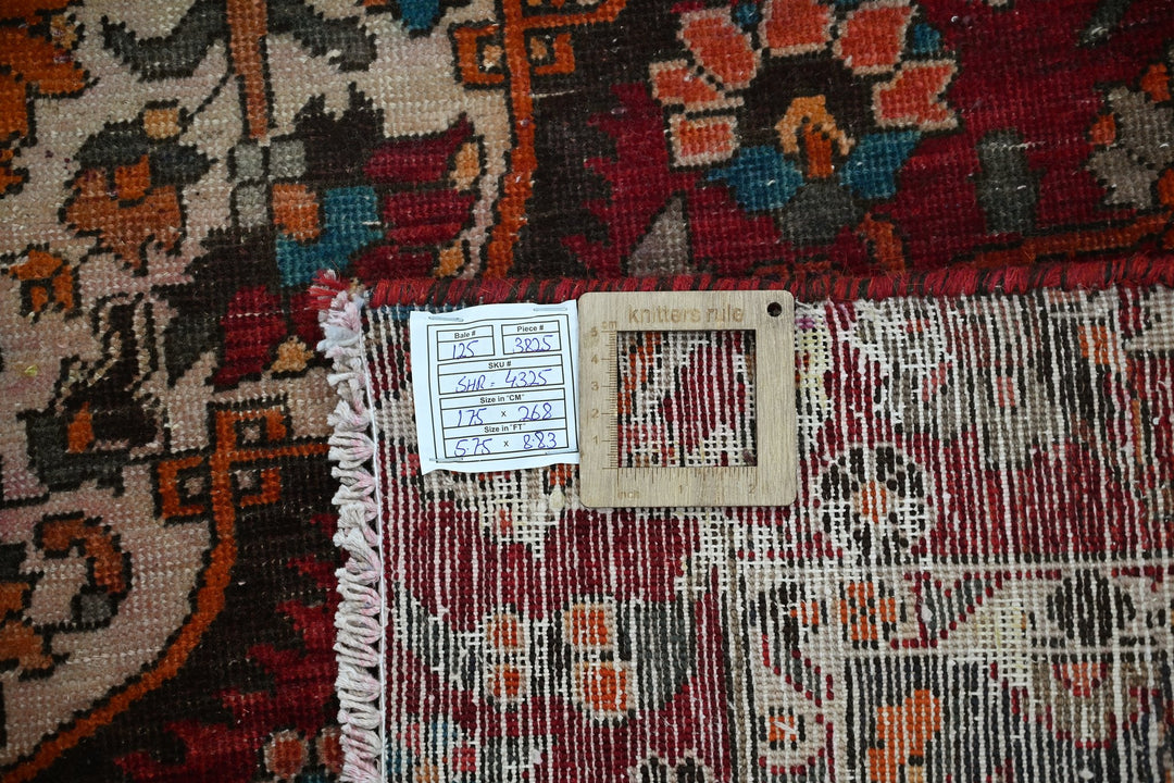 red Medium rug 5' 9" x 8' 10"