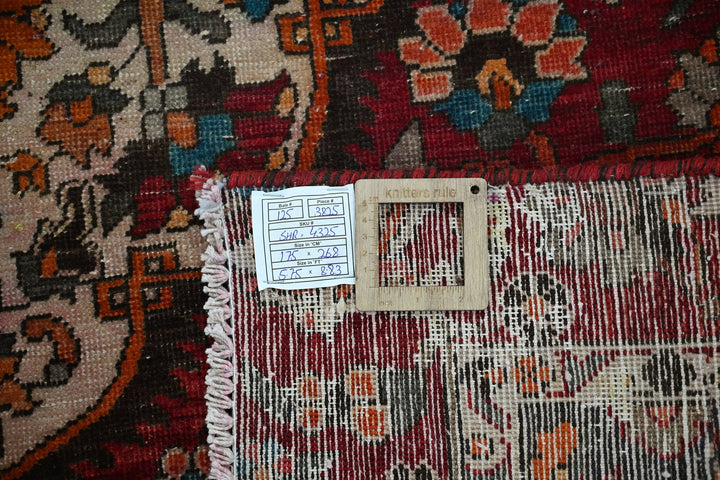 red Medium rug 5' 9" x 8' 10"