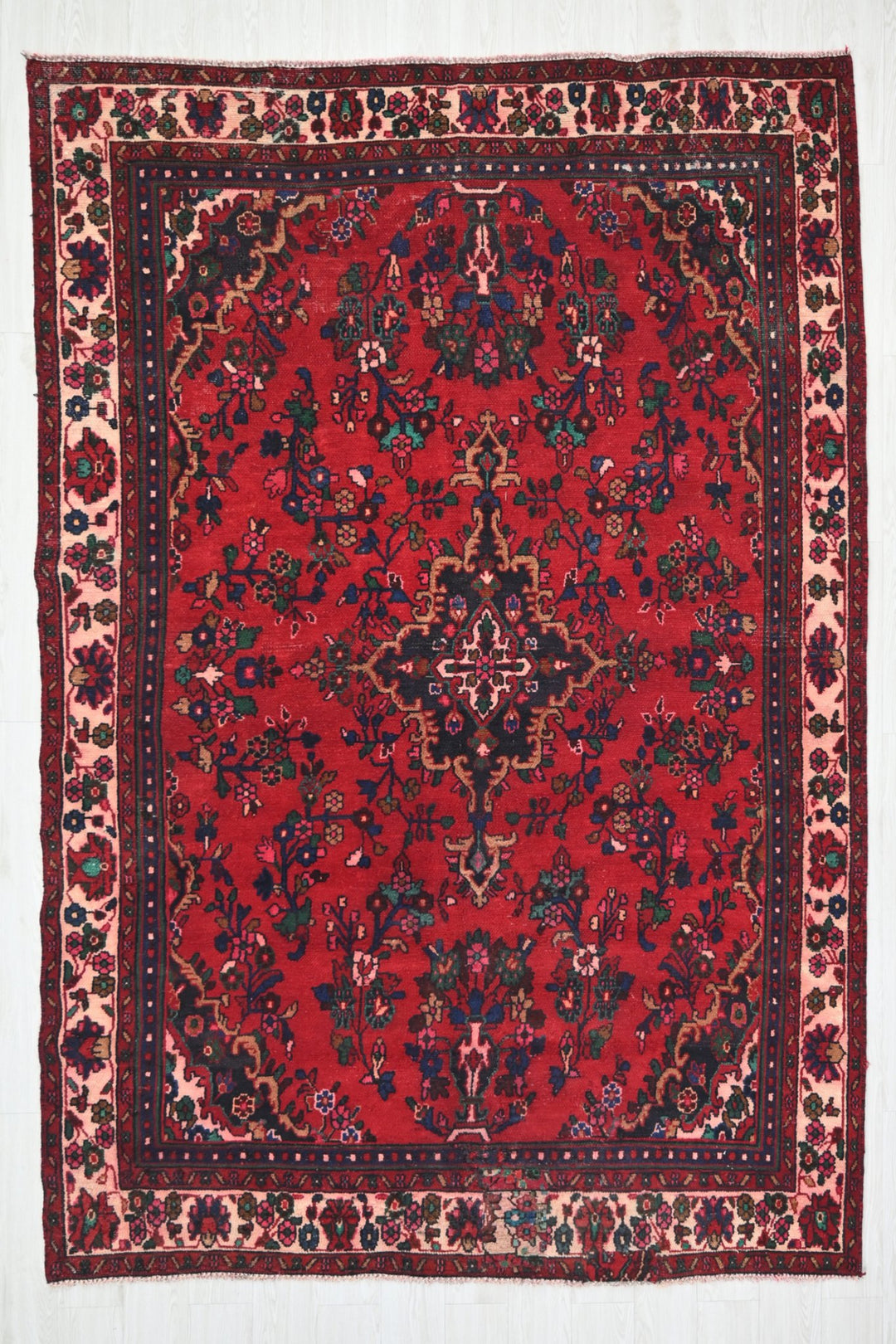 red Medium rug 6' 6" x 9' 5"