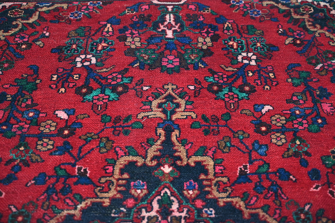 red Medium rug 6' 6" x 9' 5"