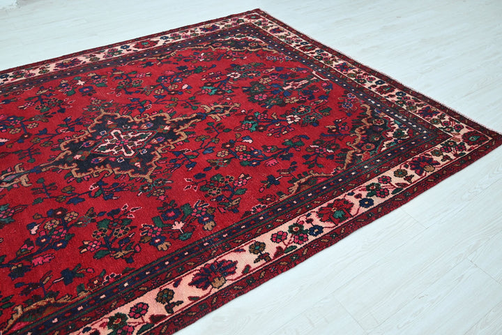 red Medium rug 6' 6" x 9' 5"