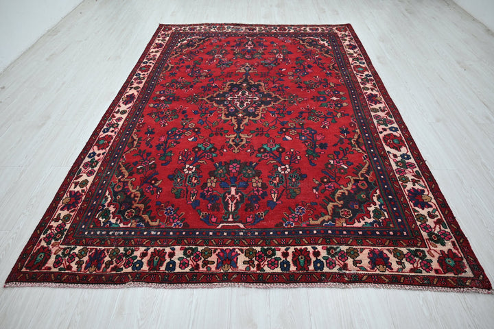 red Medium rug 6' 6" x 9' 5"