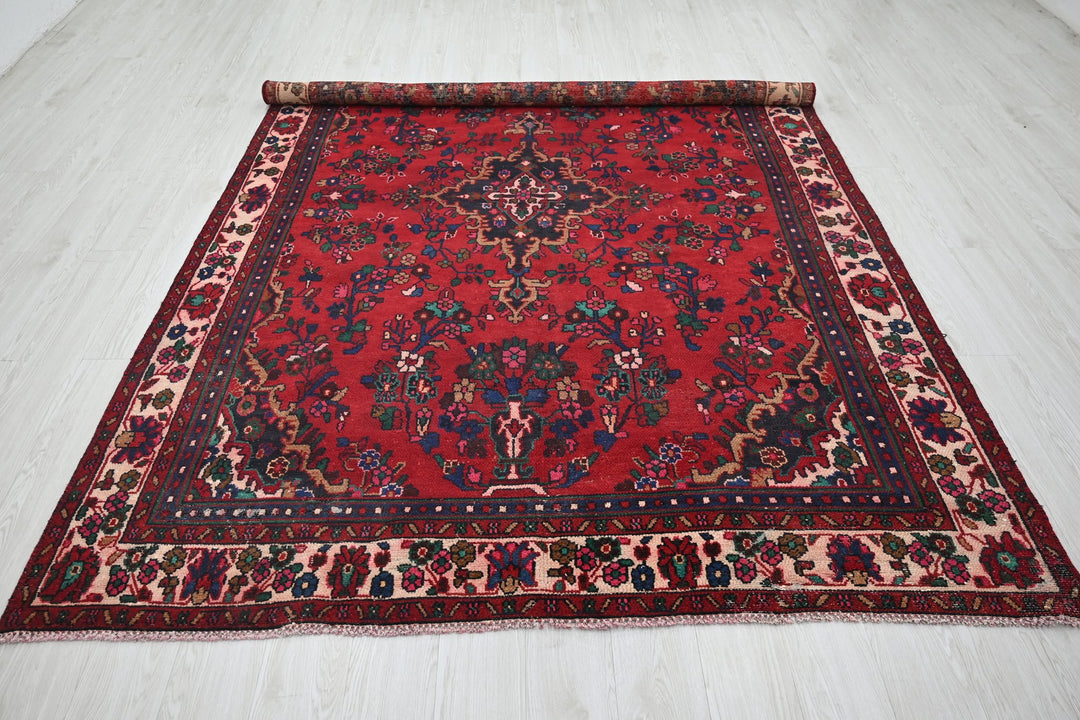 red Medium rug 6' 6" x 9' 5"
