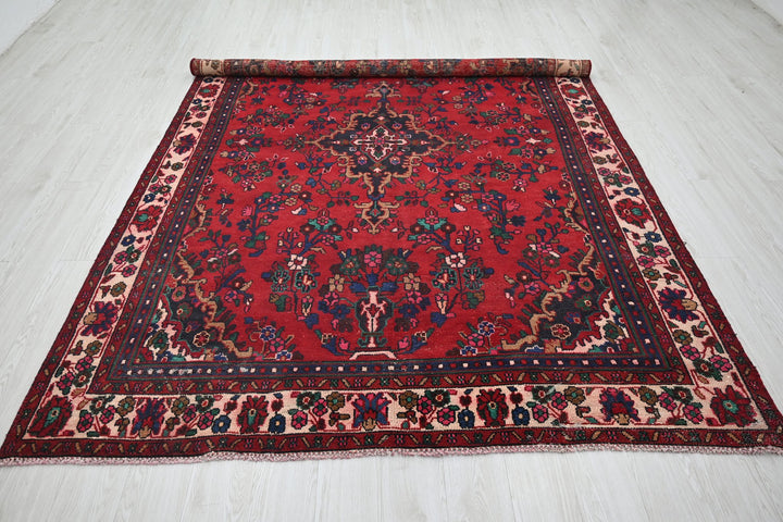 red Medium rug 6' 6" x 9' 5"