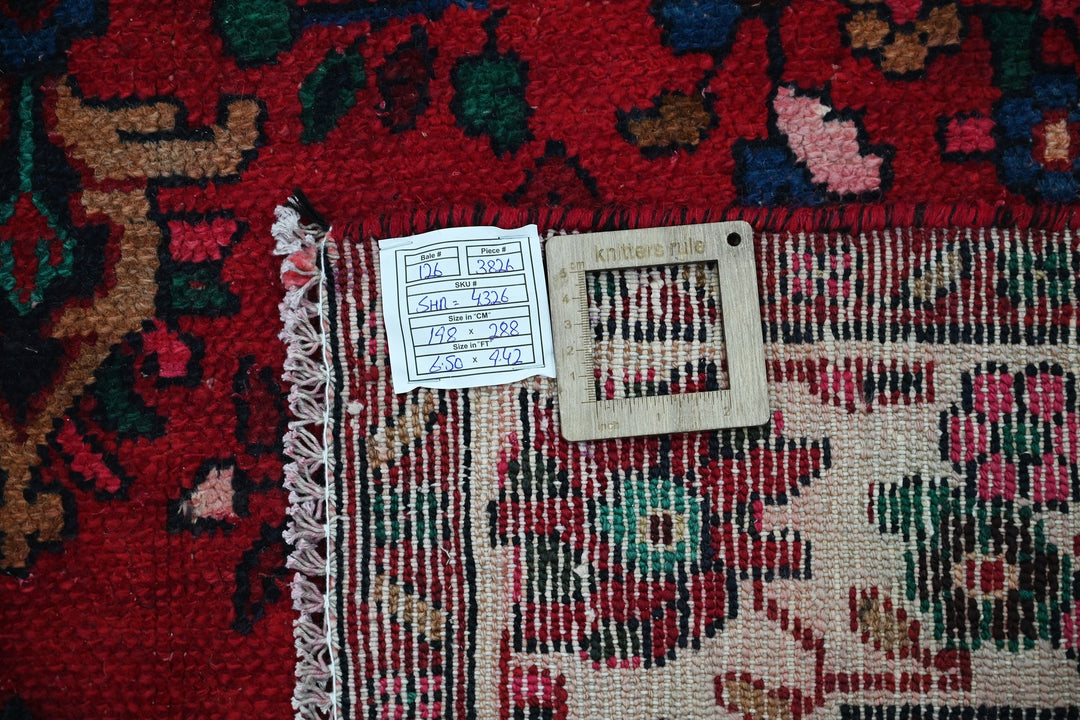 red Medium rug 6' 6" x 9' 5"
