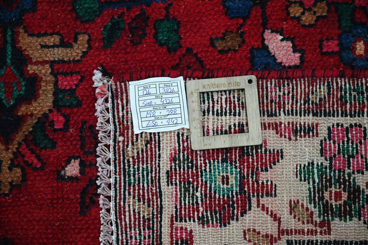 red Medium rug 6' 6" x 9' 5"