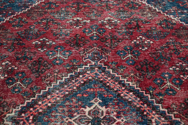 red Large rug 5' 8" x 9' 6"