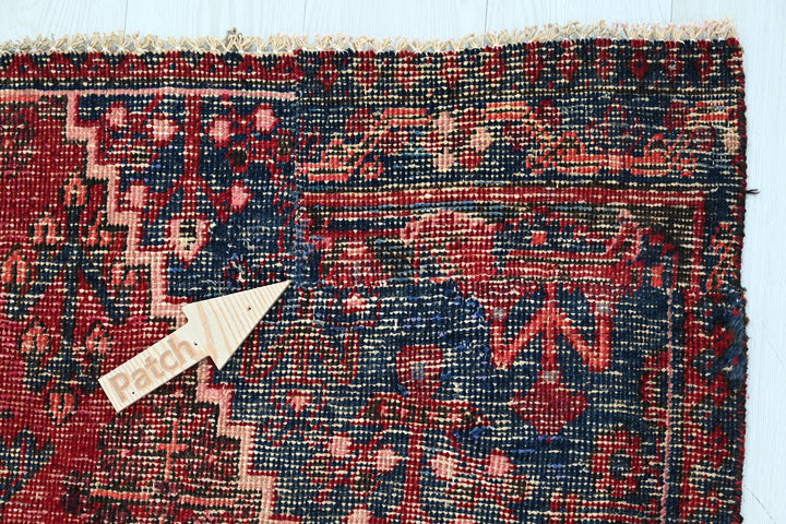 red Large rug 5' 8" x 9' 6"