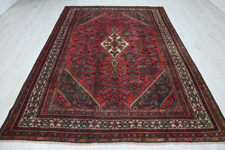 red Large rug 6' 8" x 10' 0"