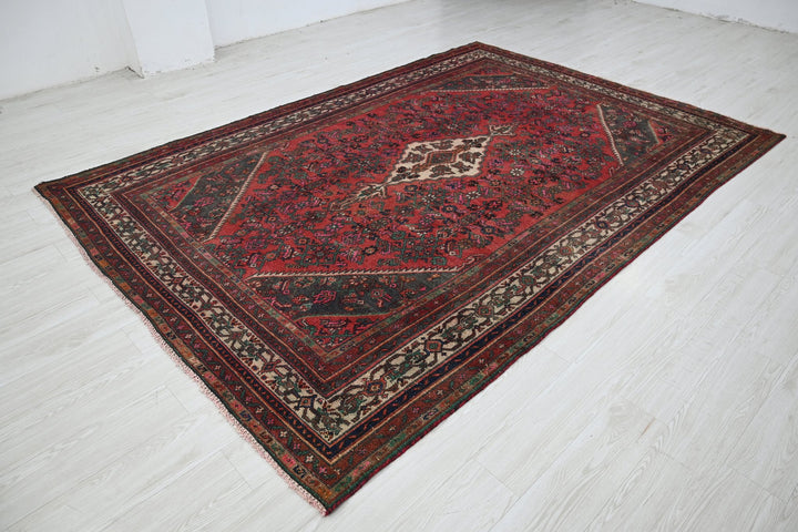 red Large rug 6' 8" x 10' 0"