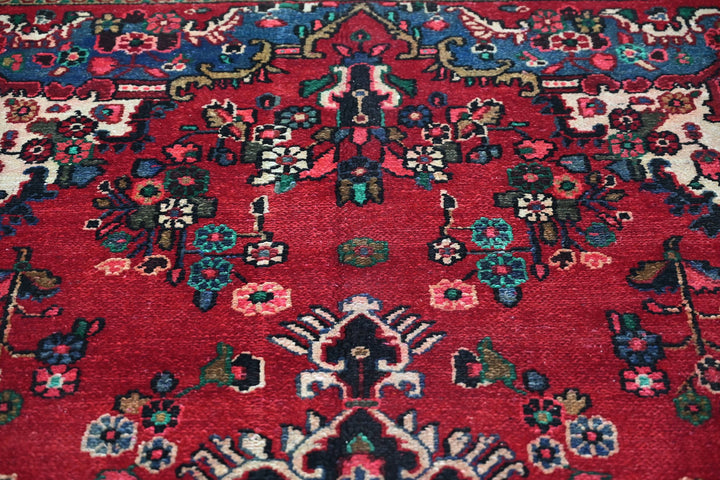 red Medium rug 6' 2" x 9' 0"