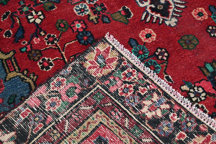 red Medium rug 6' 2" x 9' 0"