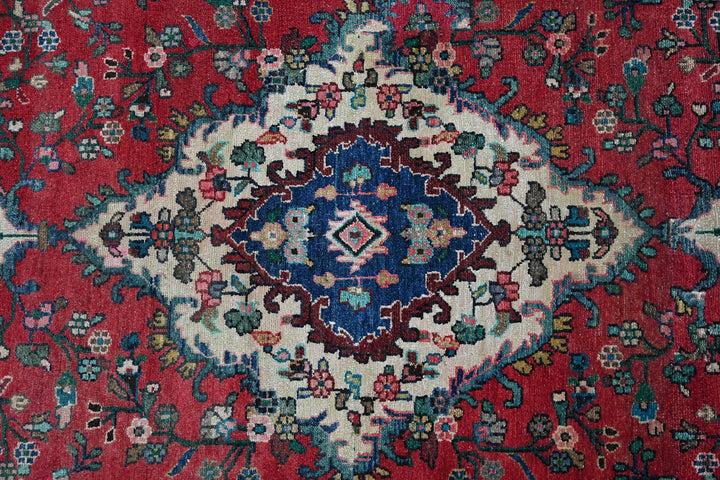 red Large rug 7' 0" x 9' 5"