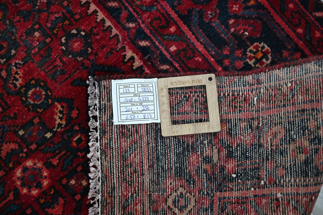 red Large rug 6' 7" x 8' 2"