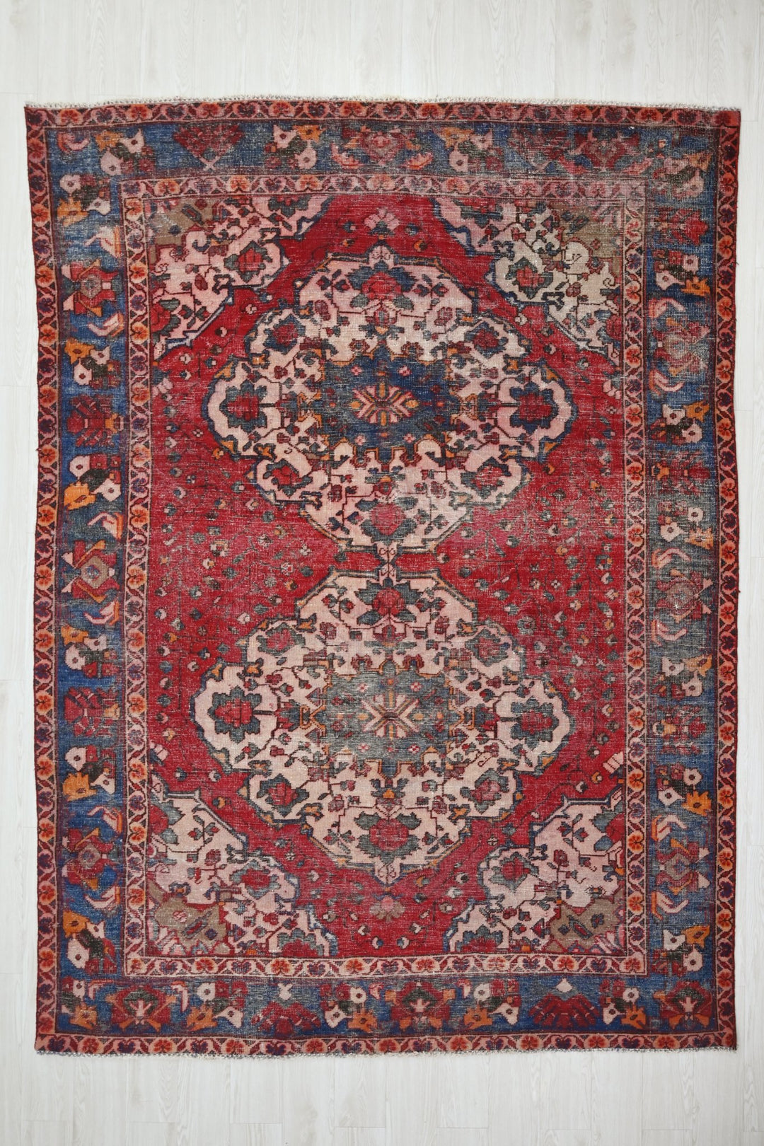 red Large rug 6' 9" x 9' 9"