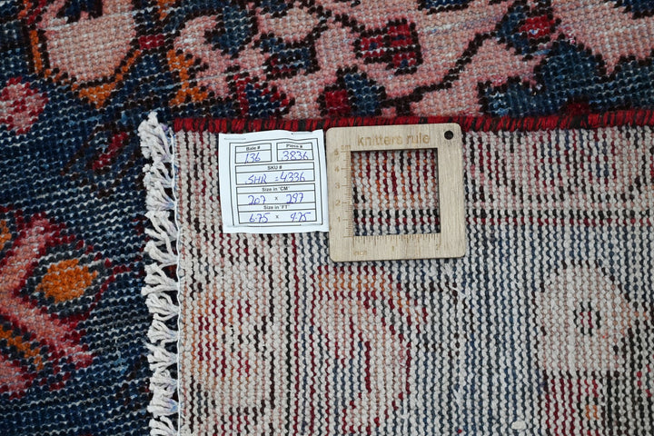 red Large rug 6' 9" x 9' 9"
