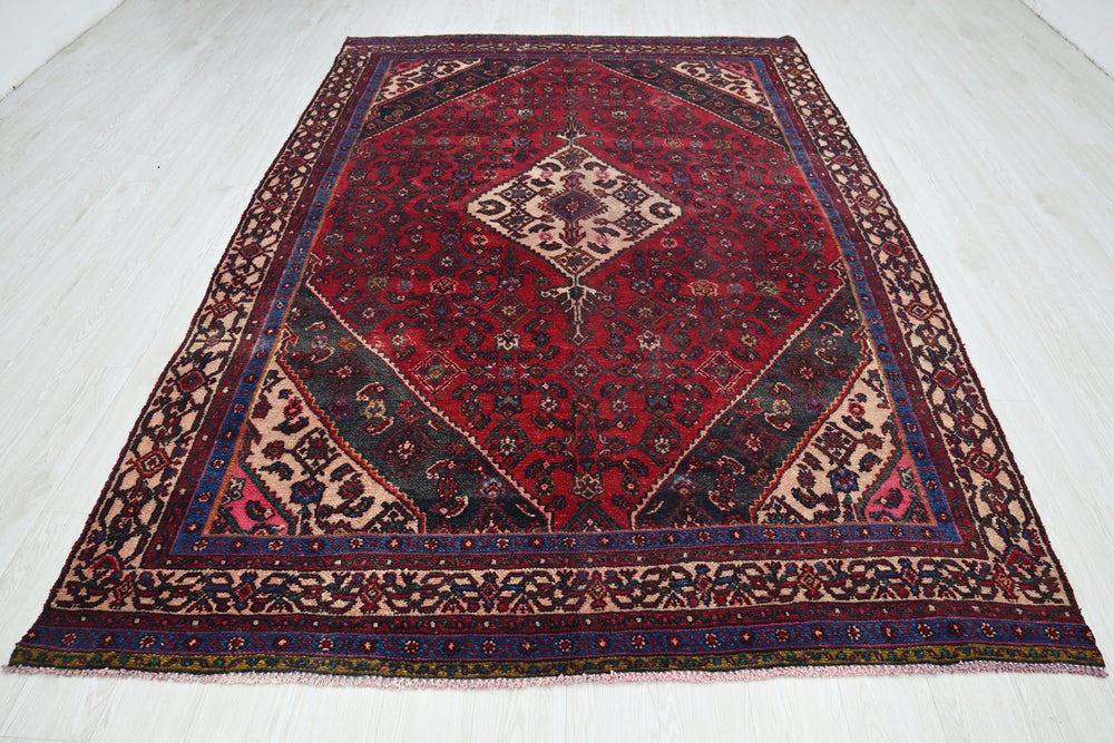 red Large rug 6' 7" x 10' 2"