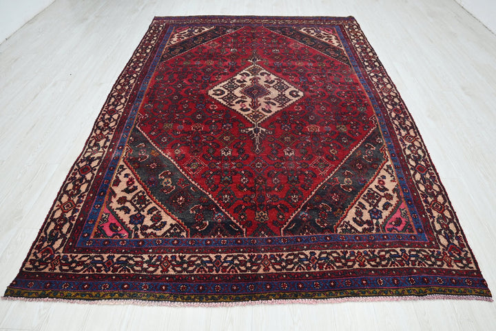 red Large rug 6' 7" x 10' 2"