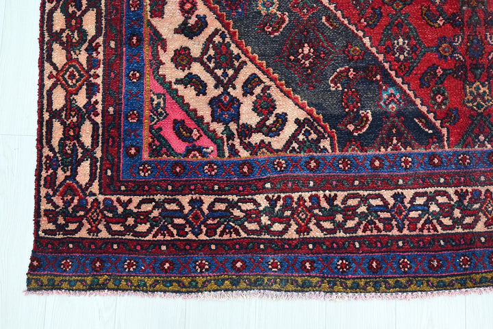 red Large rug 6' 7" x 10' 2"