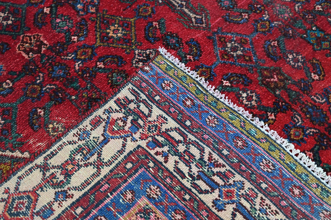 red Large rug 6' 7" x 10' 2"