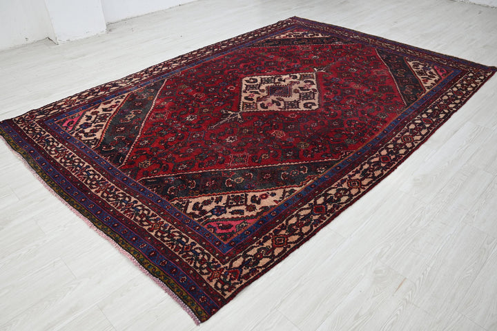 red Large rug 6' 7" x 10' 2"
