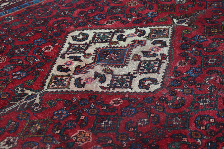 red Large rug 6' 7" x 10' 2"