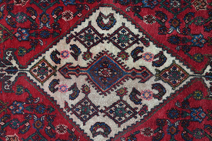 red Large rug 6' 7" x 10' 2"